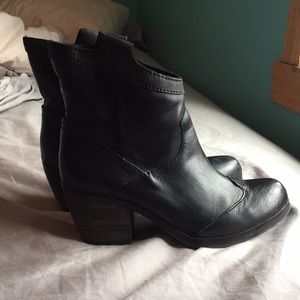 Black Calvin Klein booties. No major damage